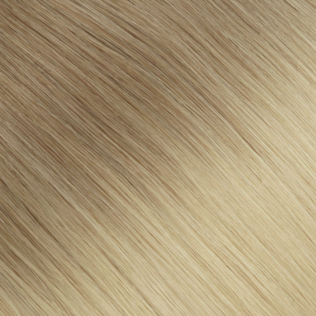 A tawny root transitioning into rich golden blonde.
Sun-drenched and dimensional.